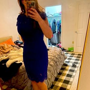 Beautiful form fitting vibrant blue lace dress